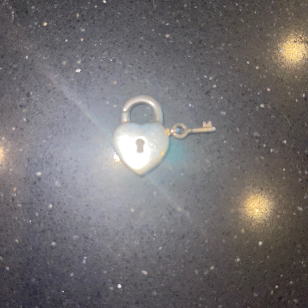Tiffany’s Heart and Lock charm. It’s a small charm maybe 1/2”